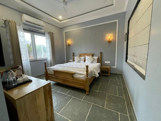 Imagen de la habitación del Hotel The Arham Resort. Foto 16