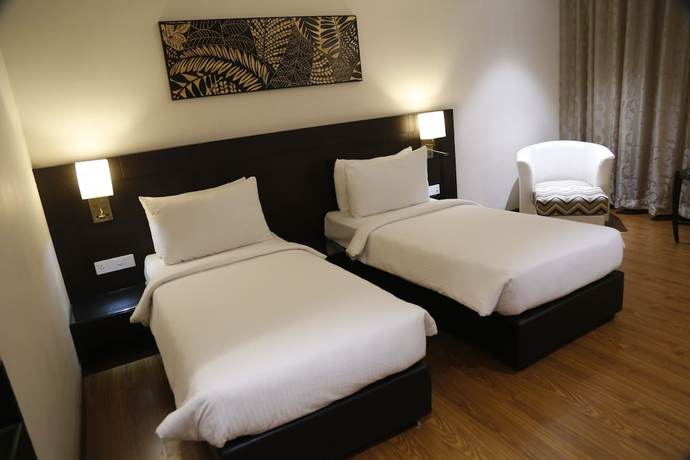 Imagen de la habitación del Hotel The Arindum. Foto 9