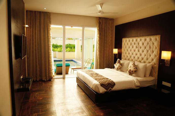 Imagen de la habitación del Hotel The Arindum. Foto 14
