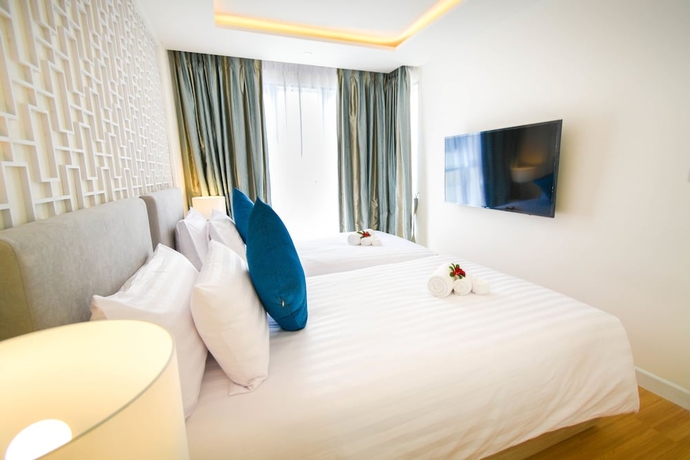 Imagen de la habitación del Hotel The Aristo Seaview Patong. Foto 13