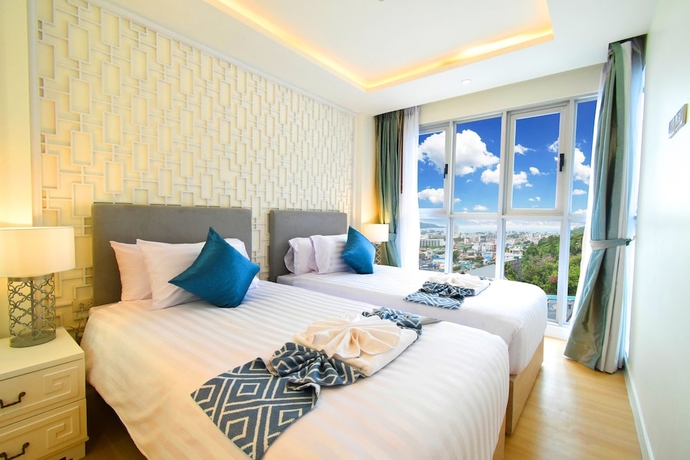 Imagen de la habitación del Hotel The Aristo Seaview Patong. Foto 15