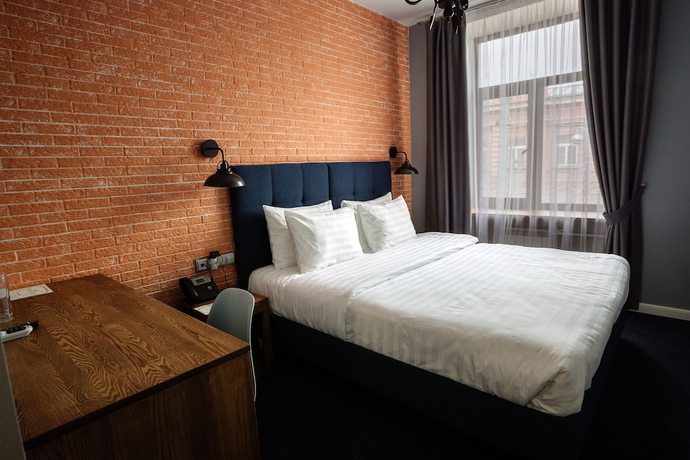 Imagen de la habitación del Hotel The Aristocrat Boutique. Foto 17