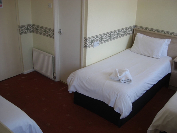 Imagen de la habitación del Hotel The Arncliffe. Foto 12
