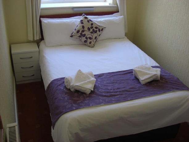 Imagen de la habitación del Hotel The Arncliffe. Foto 13