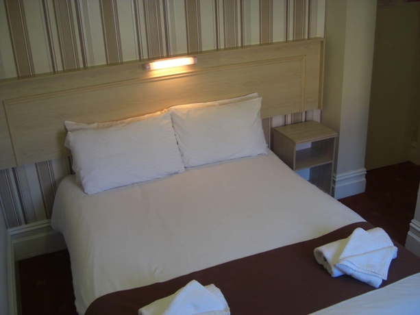 Imagen de la habitación del Hotel The Arncliffe. Foto 17
