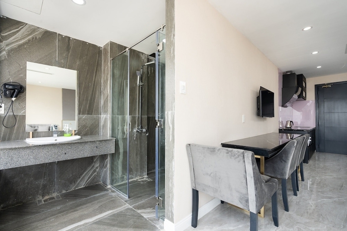 Imagen de la habitación del Hotel The Arrivals. Foto 11