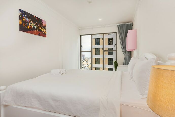 Imagen de la habitación del Hotel The Arrivals Saigon Royal. Foto 6