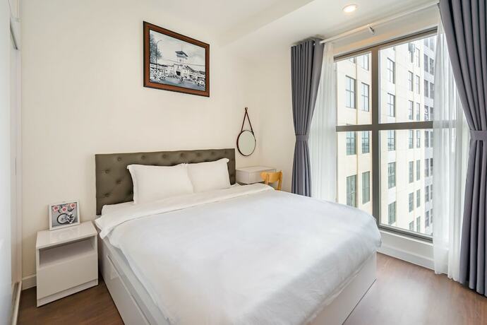 Imagen de la habitación del Hotel The Arrivals Saigon Royal. Foto 11