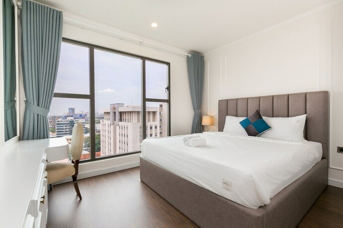 Imagen de la habitación del Hotel The Arrivals Saigon Royal. Foto 17