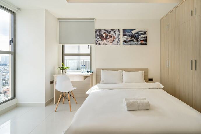 Imagen de la habitación del Hotel The Arrivals Saigon Royal. Foto 18