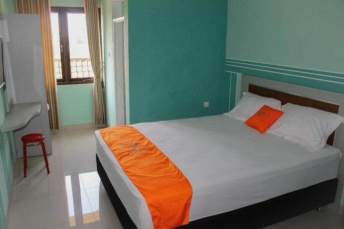 Imagen de la habitación del Hotel The Arsy Syariah Guest House. Foto 19