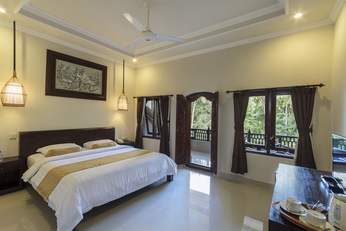 Imagen de la habitación del Hotel The Artini Dijiwa Ubud. Foto 9