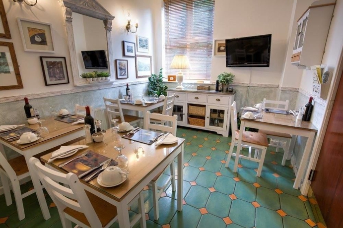 Imagen del bar/restaurante del Hotel The Ascott. Foto 2