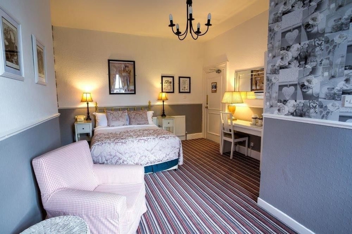 Imagen de la habitación del Hotel The Ascott. Foto 5