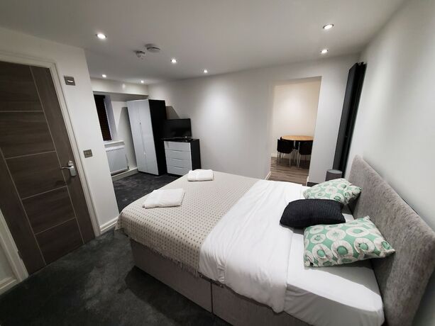 Imagen de la habitación del Hotel The Ashcroft Apartments. Foto 11
