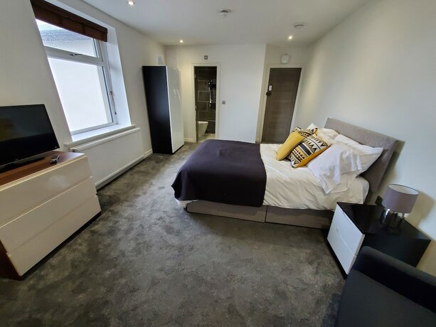 Imagen de la habitación del Hotel The Ashcroft Apartments. Foto 18