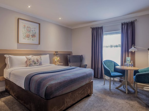 Imagen de la habitación del Hotel The Ashe. Foto 11