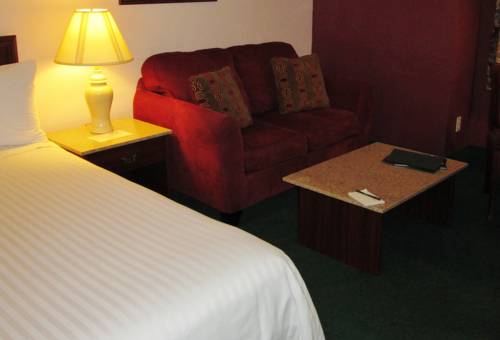 Imagen de la habitación del Hotel The Ashley Inn and Suites. Foto 3
