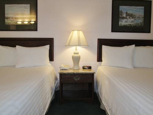 Imagen de la habitación del Hotel The Ashley Inn and Suites. Foto 8