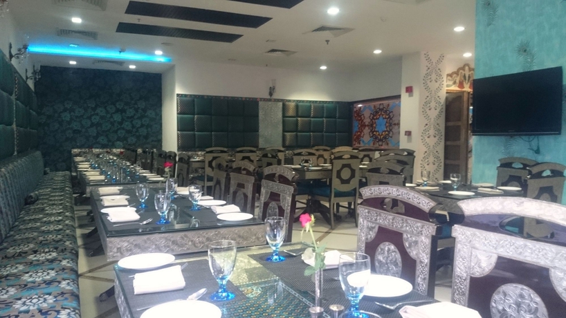 Imagen del bar/restaurante del Hotel The Ashok. Foto 3