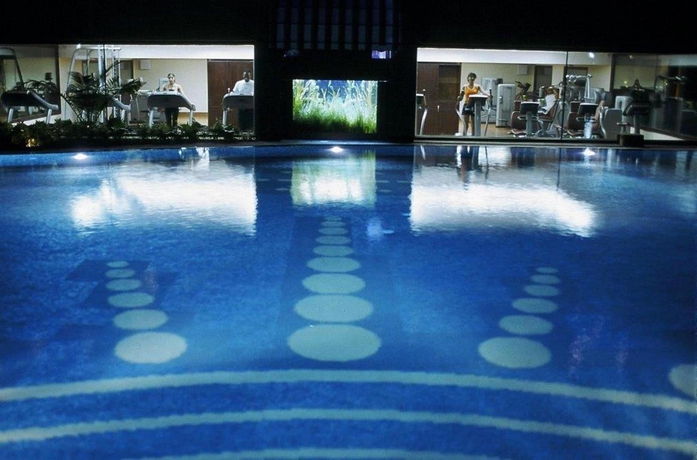 Imagen de la piscina del Hotel The Ashok. Foto 16