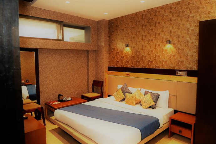 Imagen de la habitación del Hotel The Ashoka. Foto 6