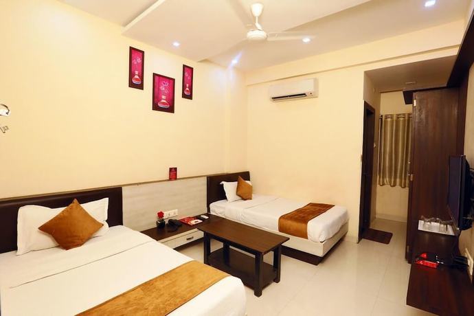 Imagen de la habitación del Hotel The Ashoka. Foto 8