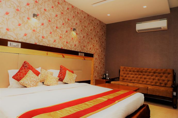 Imagen de la habitación del Hotel The Ashoka. Foto 9