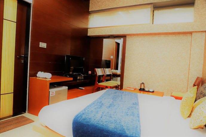 Imagen de la habitación del Hotel The Ashoka. Foto 12