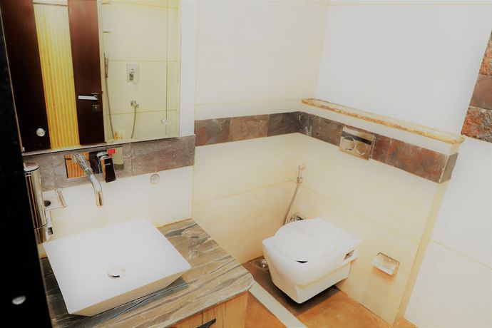 Imagen de la habitación del Hotel The Ashoka. Foto 13