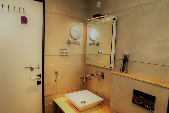 Imagen de la habitación del Hotel The Ashoka. Foto 14