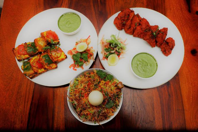 Imagen del bar/restaurante del Hotel The Ashoka. Foto 3