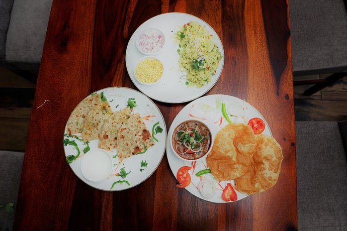 Imagen del bar/restaurante del Hotel The Ashoka. Foto 4