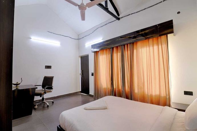 Imagen de la habitación del Hotel The Ashoka farms and Resort. Foto 10