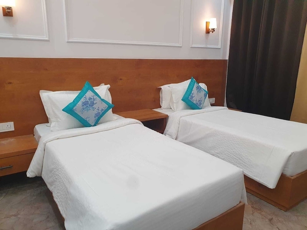 Imagen de la habitación del Hotel The Ashokas and Resorts. Foto 2