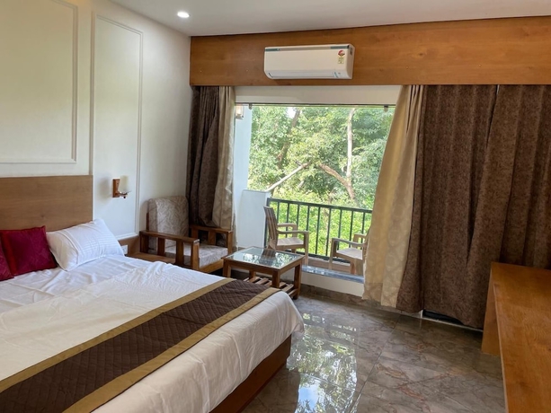Imagen de la habitación del Hotel The Ashokas and Resorts. Foto 11