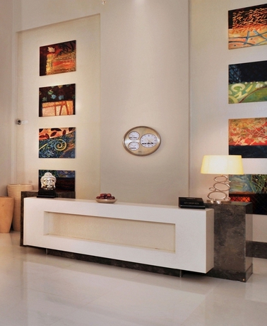 Imagen de los interiores del Hotel The Ashtan Sarovar Portico Delhi. Foto 12