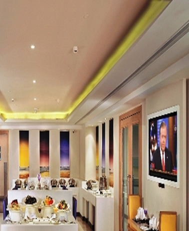 Imagen del bar/restaurante del Hotel The Ashtan Sarovar Portico Delhi. Foto 6