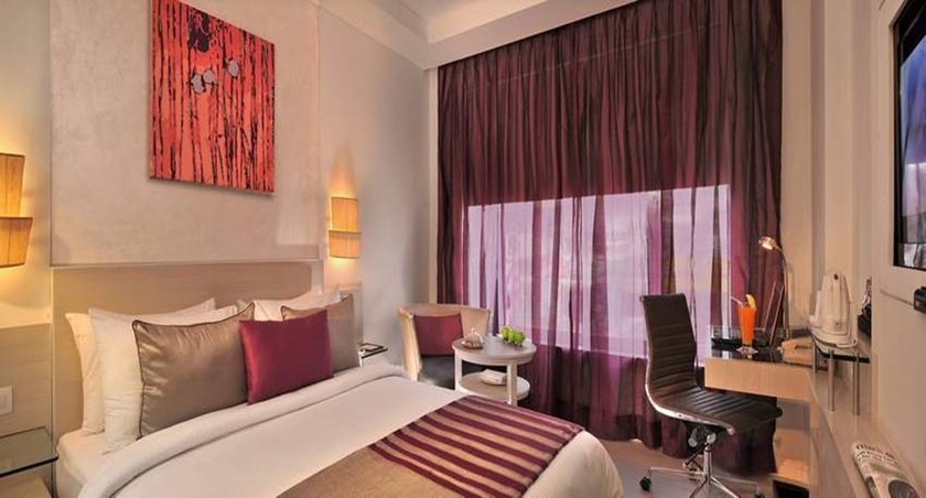 Imagen de la habitación del Hotel The Ashtan Sarovar Portico Delhi. Foto 9