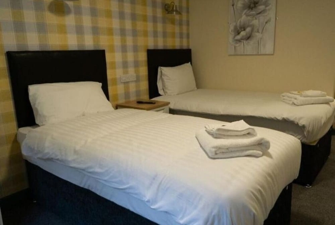 Imagen de la habitación del Hotel The Aston Inn. Foto 5
