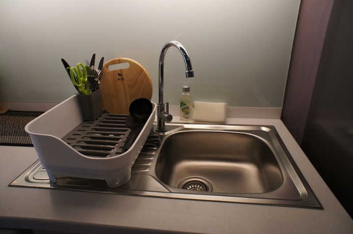 Imagen de la habitación del Hotel The Astra Luxury Suit Condo. Foto 6