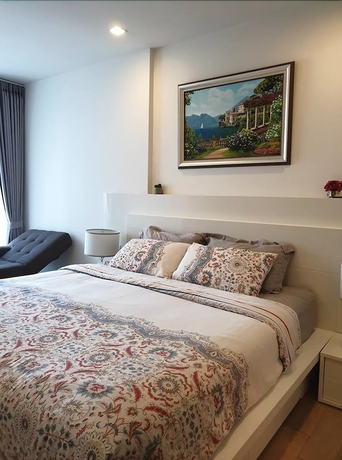 Imagen de la habitación del Hotel The Astra Luxury Suit Condo. Foto 11