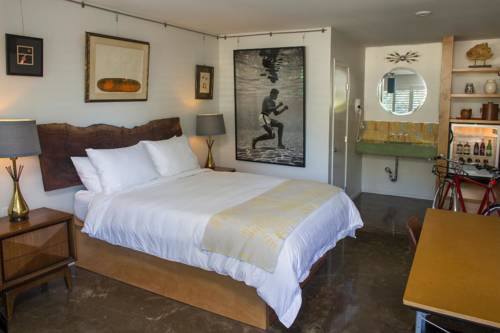 Imagen de la habitación del Hotel The Astro. Foto 3