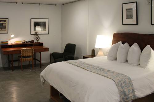 Imagen de la habitación del Hotel The Astro. Foto 5