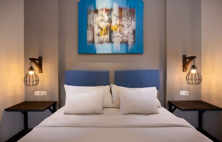 Imagen de la habitación del Hotel The Aswana Seminyak. Foto 16