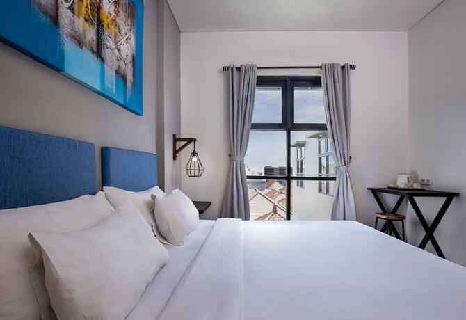 Imagen de la habitación del Hotel The Aswana Seminyak. Foto 18
