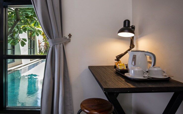 Imagen de la habitación del Hotel The Aswana Seminyak. Foto 22