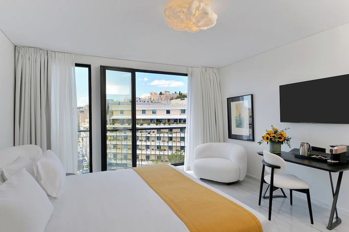 Imagen de la habitación del Hotel The Athenaeum. Foto 4