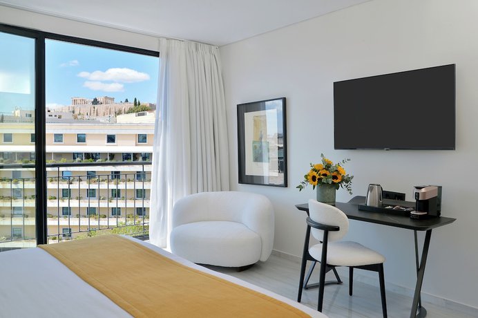 Imagen de la habitación del Hotel The Athenaeum. Foto 5