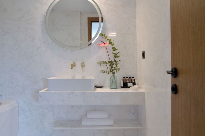 Imagen de la habitación del Hotel The Athenaeum. Foto 11